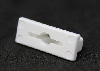 Zátka pro fixaci pásky